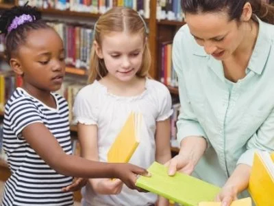 Teacher teaching children